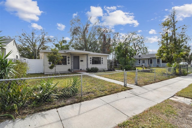 single story home with a front yard