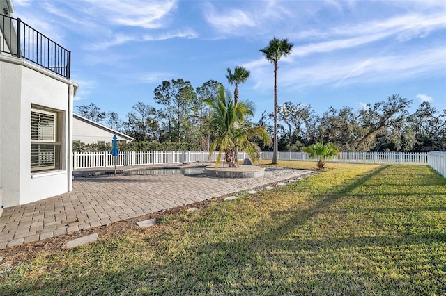 view of yard with a patio area and a fenced backyard