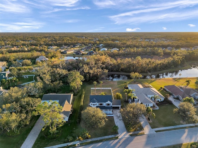 bird's eye view with a water view and a residential view