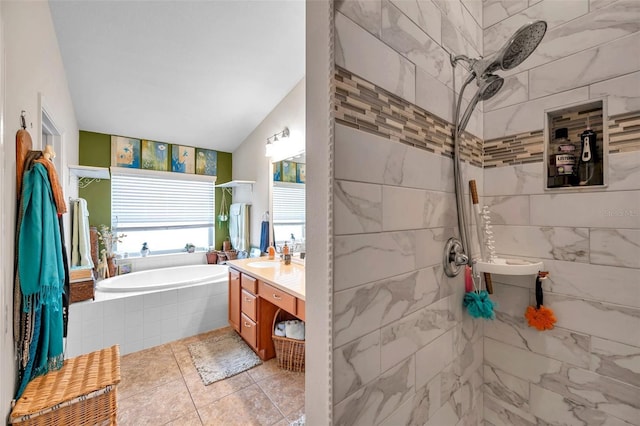 bathroom featuring vanity, lofted ceiling, and independent shower and bath