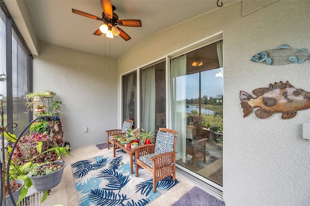 exterior space featuring ceiling fan