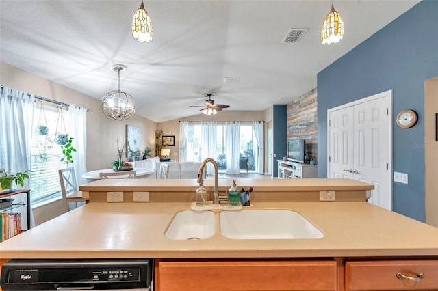 5720 107th Ter E, Parrish, FL 34219 - kitchen with open floor plan, light countertops, a ceiling fan, decorative light fixtures, and vaulted ceiling