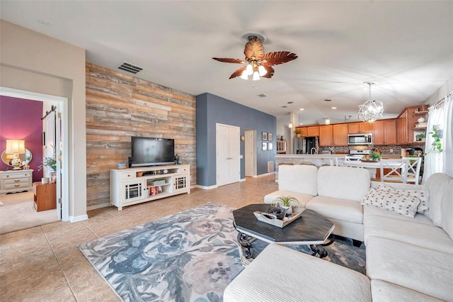 5720 107th Ter E, Parrish, FL 34219 - living room with ceiling fan, light tile patterned floors, recessed lighting, and a chandelier
