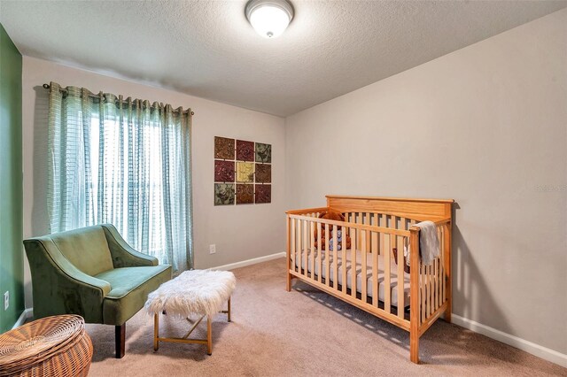 5720 107th Ter E, Parrish, FL 34219 - carpeted bedroom featuring a textured ceiling and baseboards