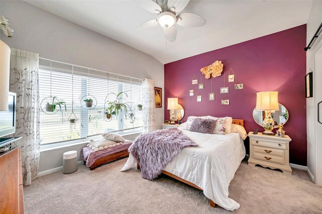 5720 107th Ter E, Parrish, FL 34219 - carpeted bedroom featuring multiple windows, lofted ceiling, and ceiling fan