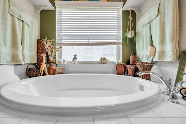 5720 107th Ter E, Parrish, FL 34219 - bathroom featuring a garden tub and tile patterned flooring