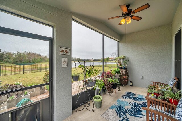 5720 107th Ter E, Parrish, FL 34219 - sunroom featuring ceiling fan, healthy amount of natural light, and a water view
