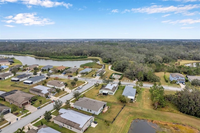 5720 107th Ter E, Parrish, FL 34219 - aerial view of property and surrounding area with a large body of water and nearby suburban area