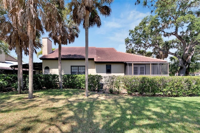 exterior space with a yard