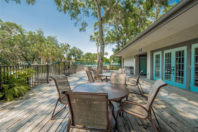 wooden deck featuring french doors