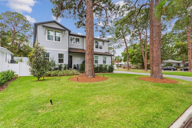 view of front of home featuring a front lawn