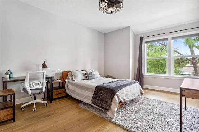 bedroom with light wood-type flooring