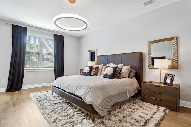 bedroom featuring light hardwood / wood-style floors