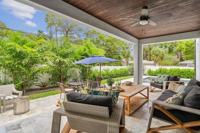 view of patio featuring ceiling fan and outdoor lounge area