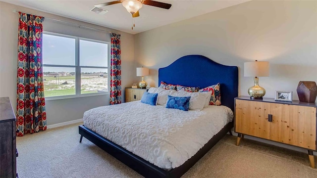 carpeted bedroom featuring ceiling fan