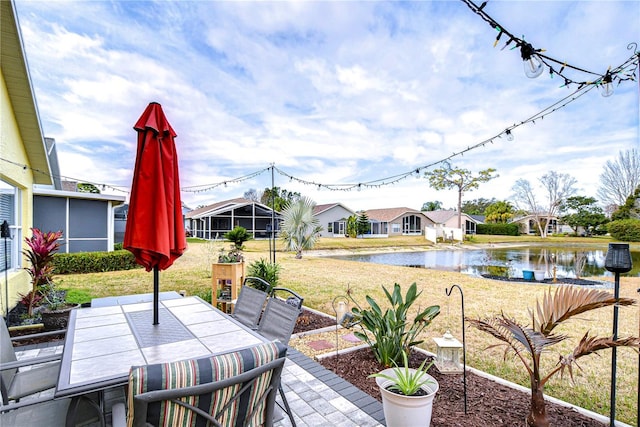 view of patio featuring a water view