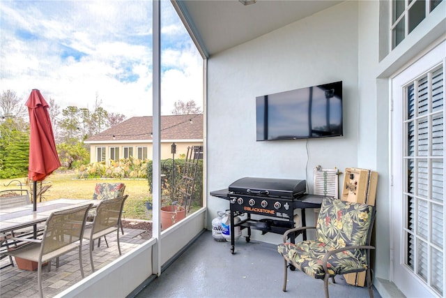 sunroom / solarium with a healthy amount of sunlight