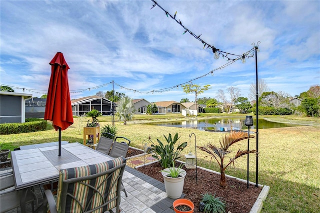 view of patio / terrace with a water view