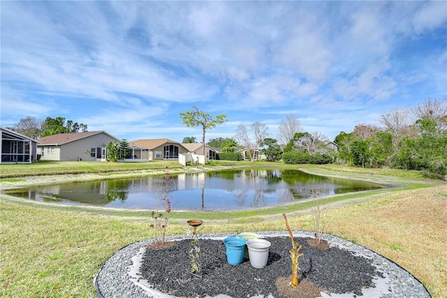 view of yard with a water view