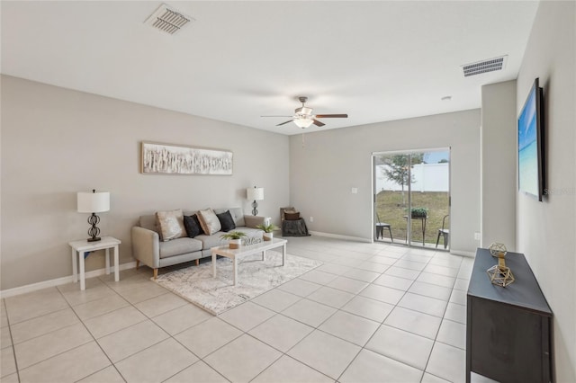 tiled living room with ceiling fan