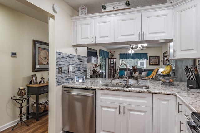 kitchen with range, dishwasher, white cabinets, sink, and dark wood-type flooring