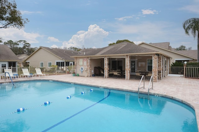 view of pool featuring a patio area