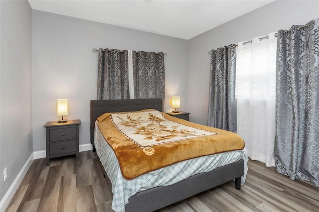 bedroom featuring hardwood / wood-style flooring