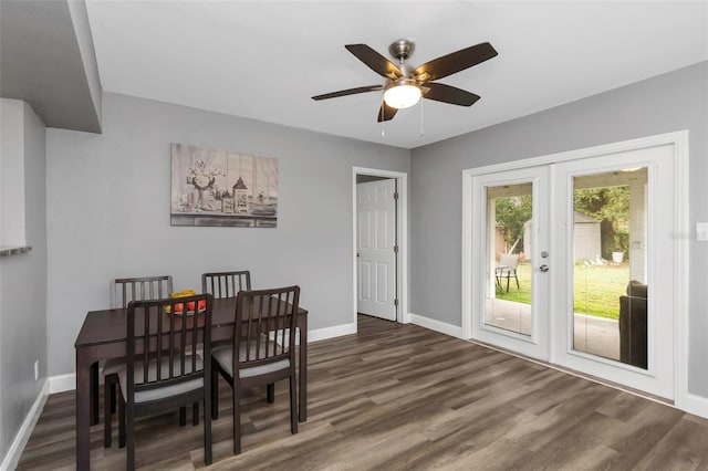 dining room featuring ceiling fan, french doors, and dark hardwood / wood-style flooring