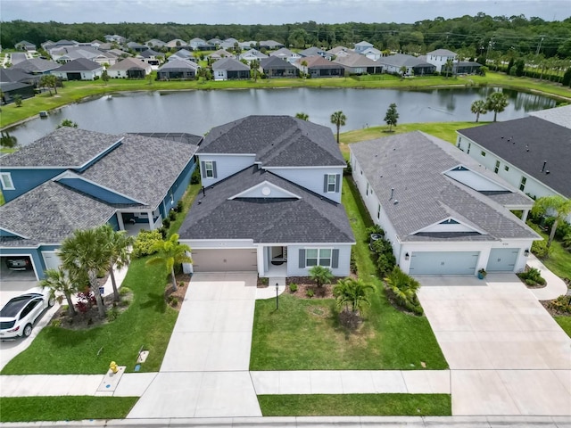 bird's eye view with a water view