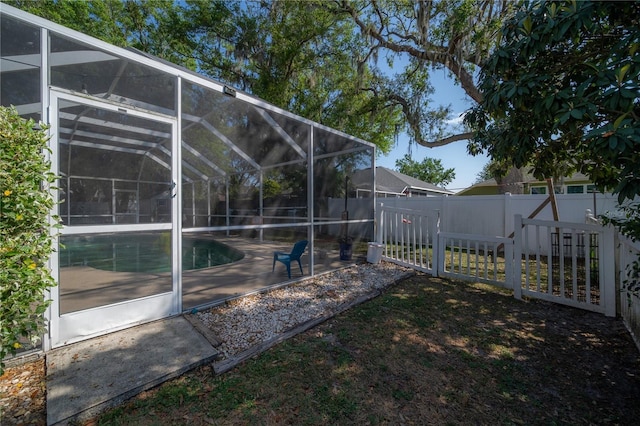 exterior space with a lanai and a patio