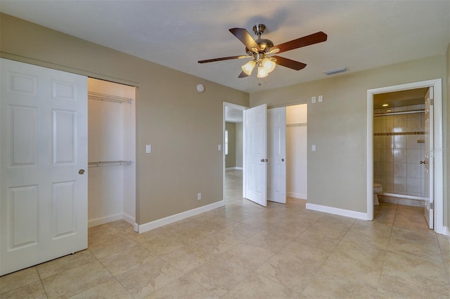 unfurnished bedroom with ceiling fan and ensuite bath