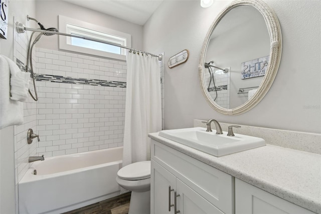 full bathroom with shower / tub combo, vanity, toilet, and hardwood / wood-style floors