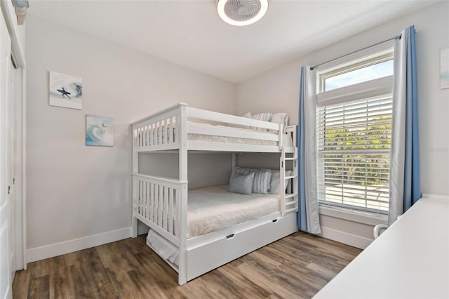 bedroom featuring dark wood-type flooring