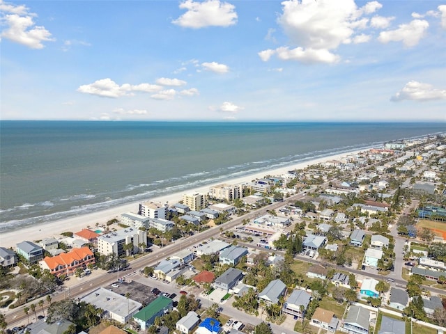 bird's eye view featuring a water view and a view of the beach