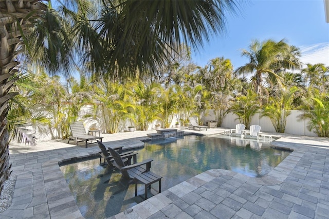 view of swimming pool with a patio