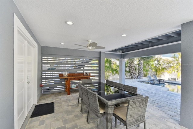 view of patio with ceiling fan