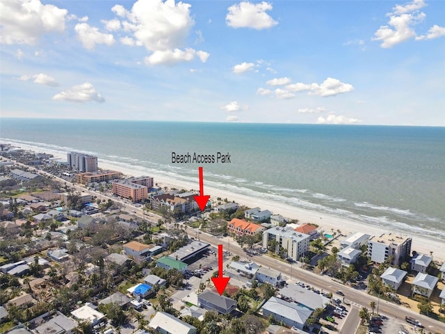 aerial view featuring a water view and a view of the beach