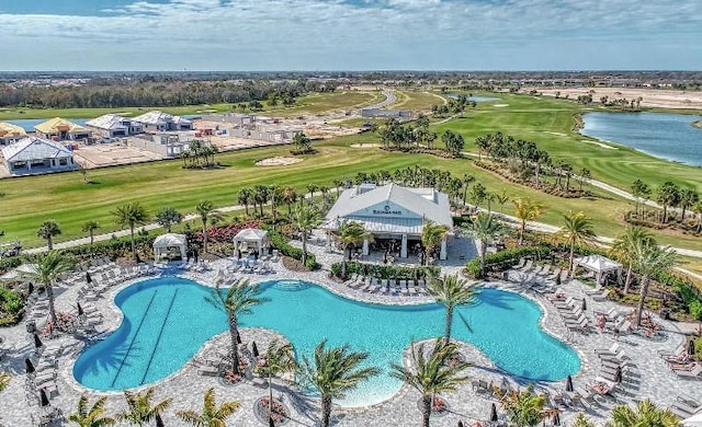 view of pool with a water view