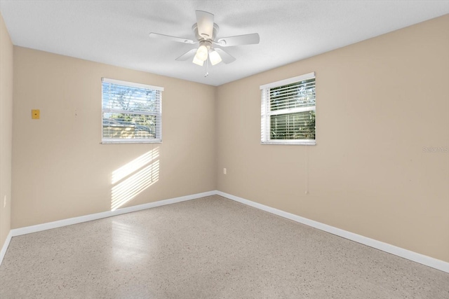 empty room featuring ceiling fan