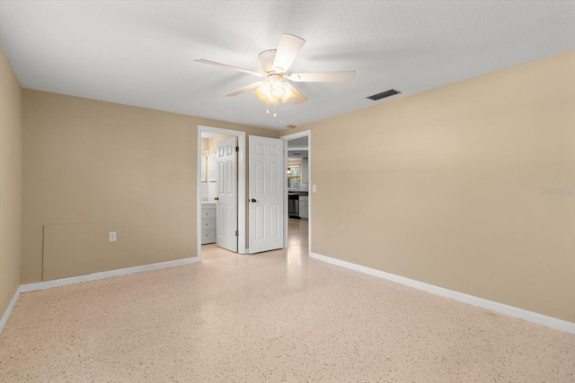 unfurnished room featuring ceiling fan