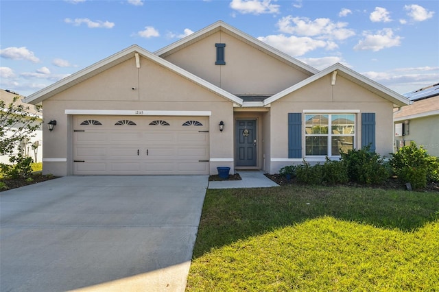 single story home with a garage and a front yard