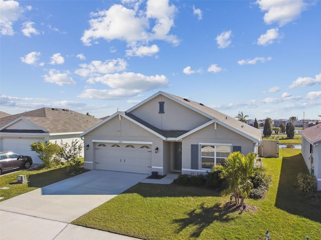 ranch-style home featuring a garage, stucco siding, concrete driveway, and a front yard