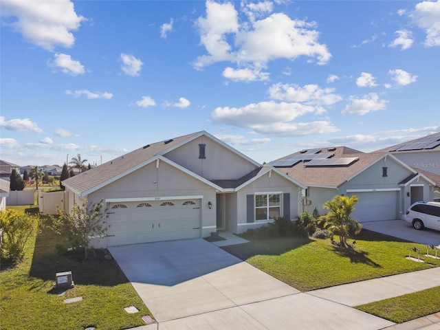 ranch-style house with a garage, concrete driveway, a front yard, and fence