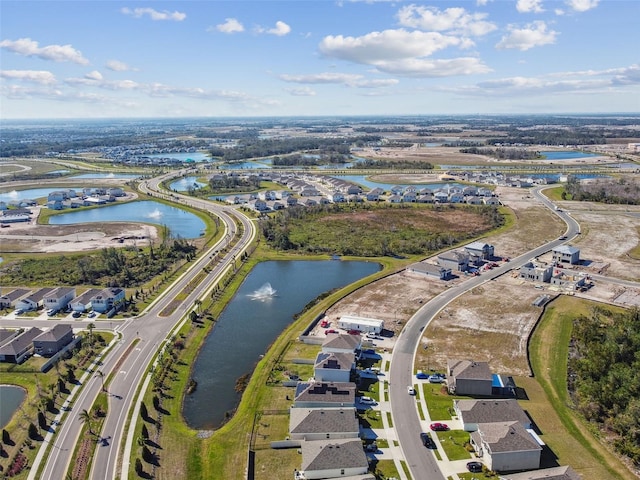 drone / aerial view featuring a water view