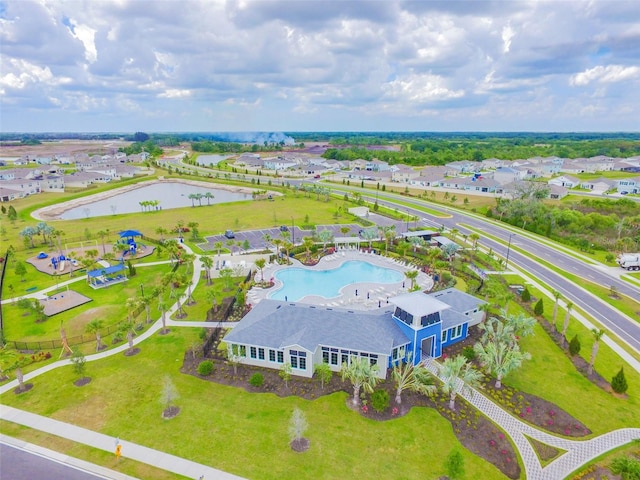 drone / aerial view with a water view