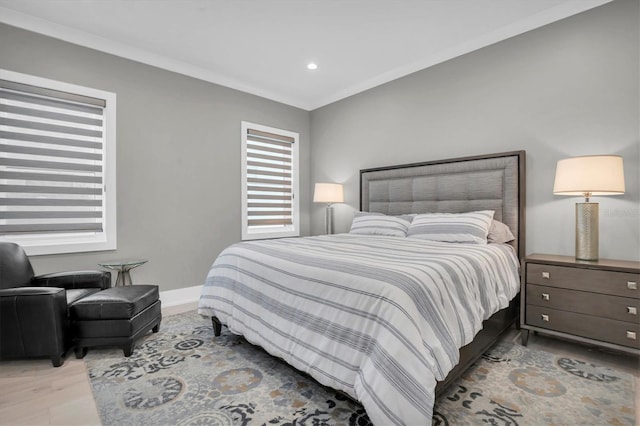 bedroom with crown molding