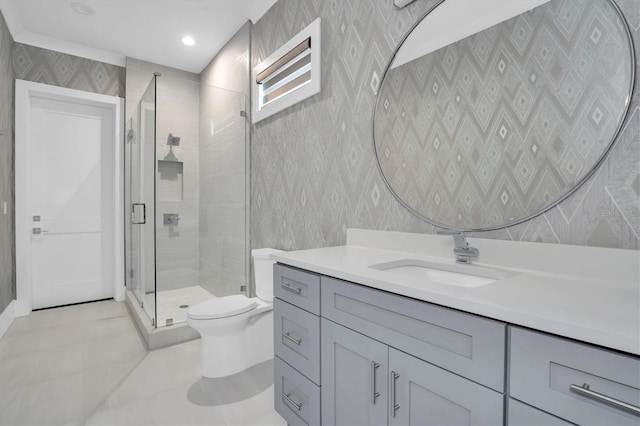 bathroom featuring vanity, tile patterned flooring, a shower with door, and toilet