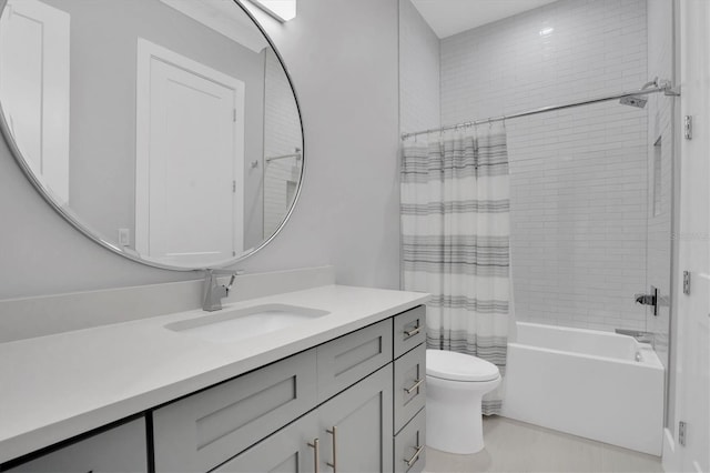 full bathroom featuring shower / bathtub combination with curtain, vanity, and toilet