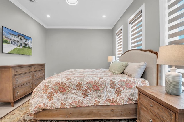 bedroom featuring crown molding