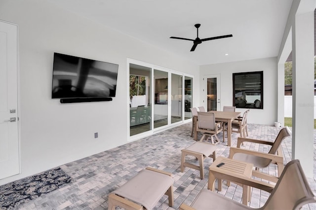 exterior space featuring a healthy amount of sunlight and ceiling fan